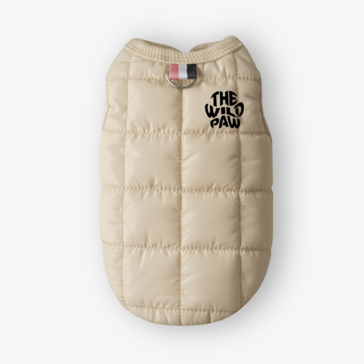 Beige puffer dog vest with 'The Wild Paw' logo on a white background
