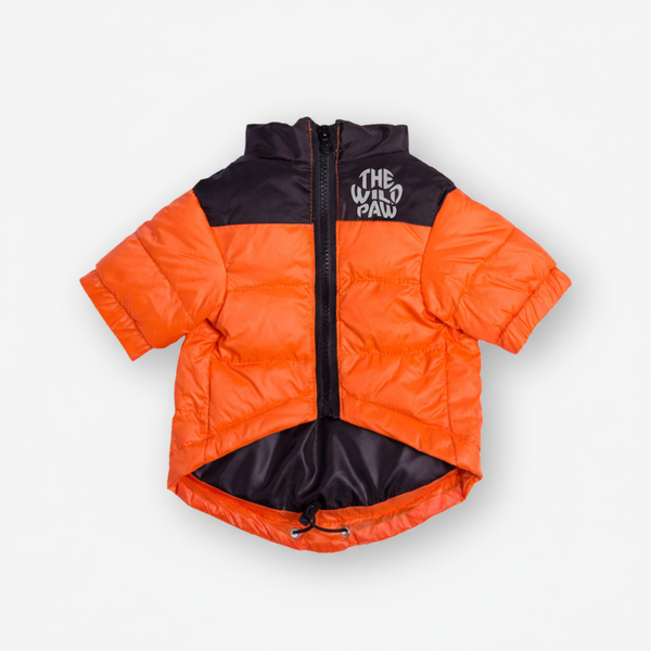 Orange and black The Dog Face jacket with 'The Wild Paw' logo on a light gray background